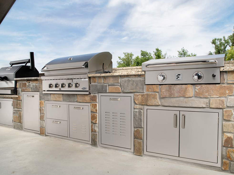 Fusion two-burner gas griddle installed in a stone outdoor kitchen