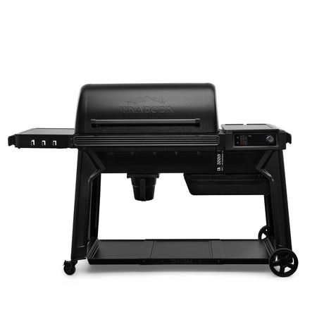 black traeger woodridge pro pellet grill on a white background