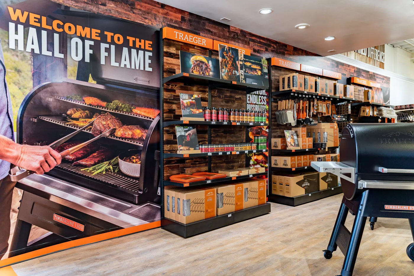 Texas Star Grill Shop store interior showcasing Traeger BBQ grills, seasonings, sauces, and accessories