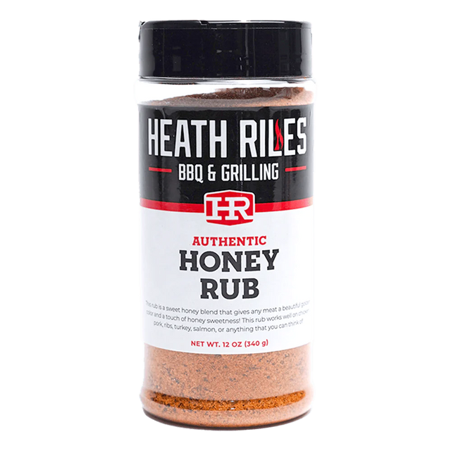 12 ounce shaker bottle filled with heath riles bbq & grilling honey rub, a sweet and savory blend thats great on pork, chicken, or even fish