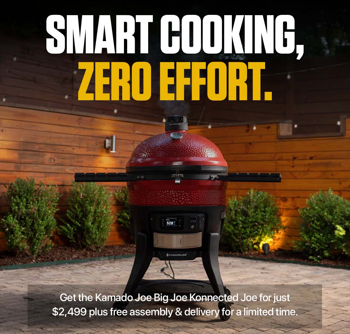 A red Kamado Joe Big Joe Konnected Joe smart ceramic grill in a backyard setting. Bold text reads: SMART COOKING, ZERO EFFORT. Subtext: Get the Kamado Joe Big Joe Konnected Joe for just $2,499 plus free assembly & delivery for a limited time.