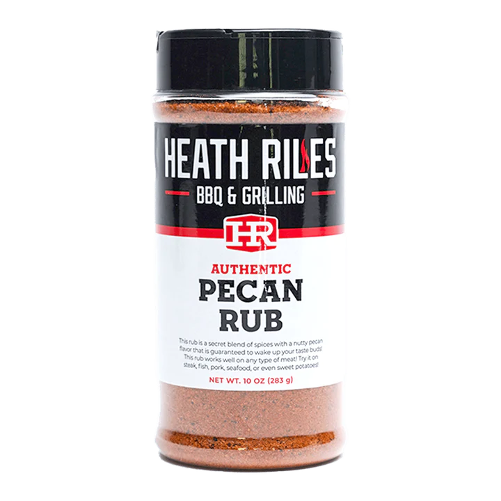 10 ounce shaker bottle full of heath riles bbq & grilling pecan rub, a sweet and savory blend with a pecan forward flavor