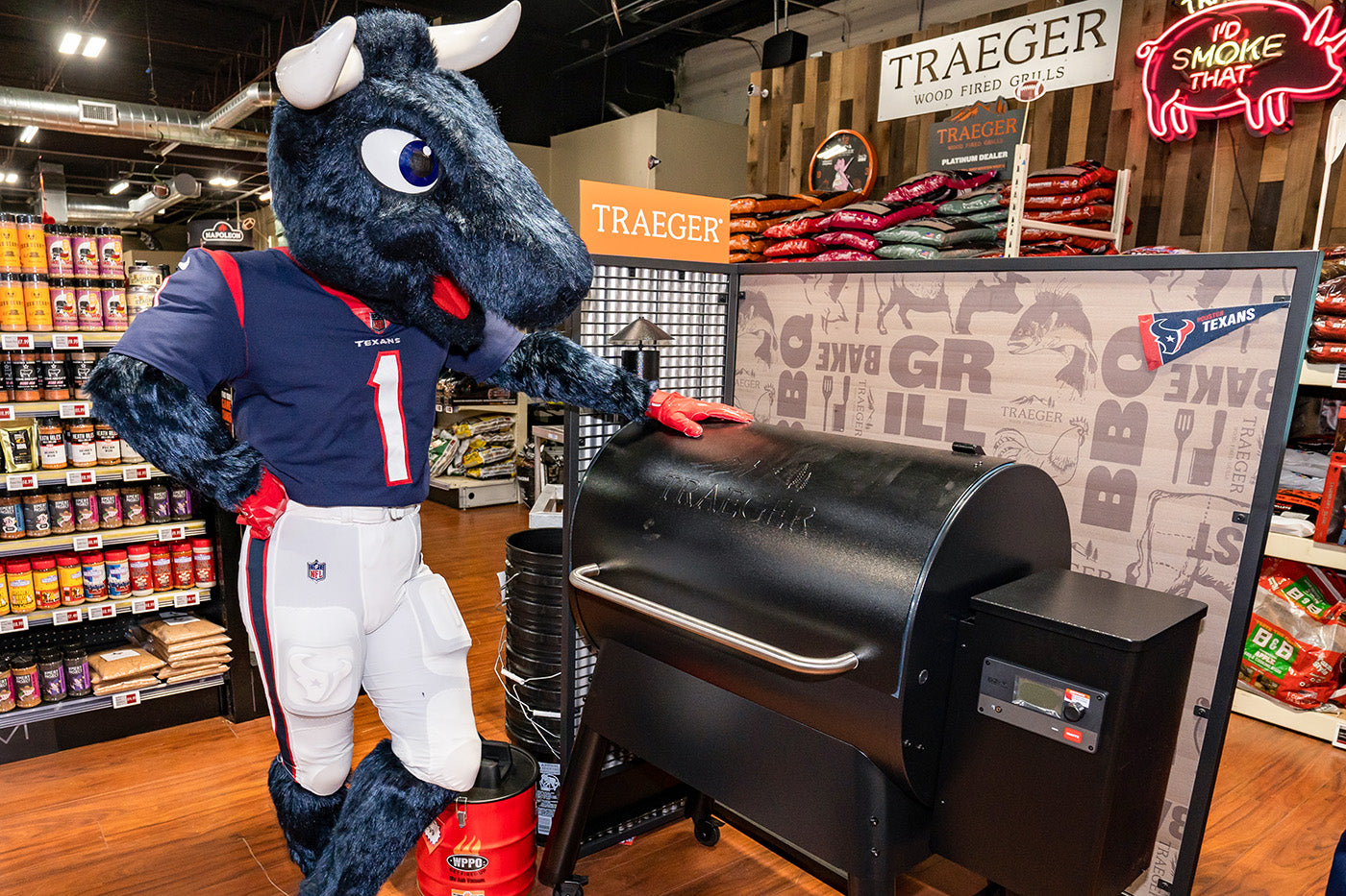 houston texans mascot, Toro with his Traeger Pro 780 wood pellet grill from Texas Star Grill Shop, Houston's #1 Traeger wood pellet grill dealer
