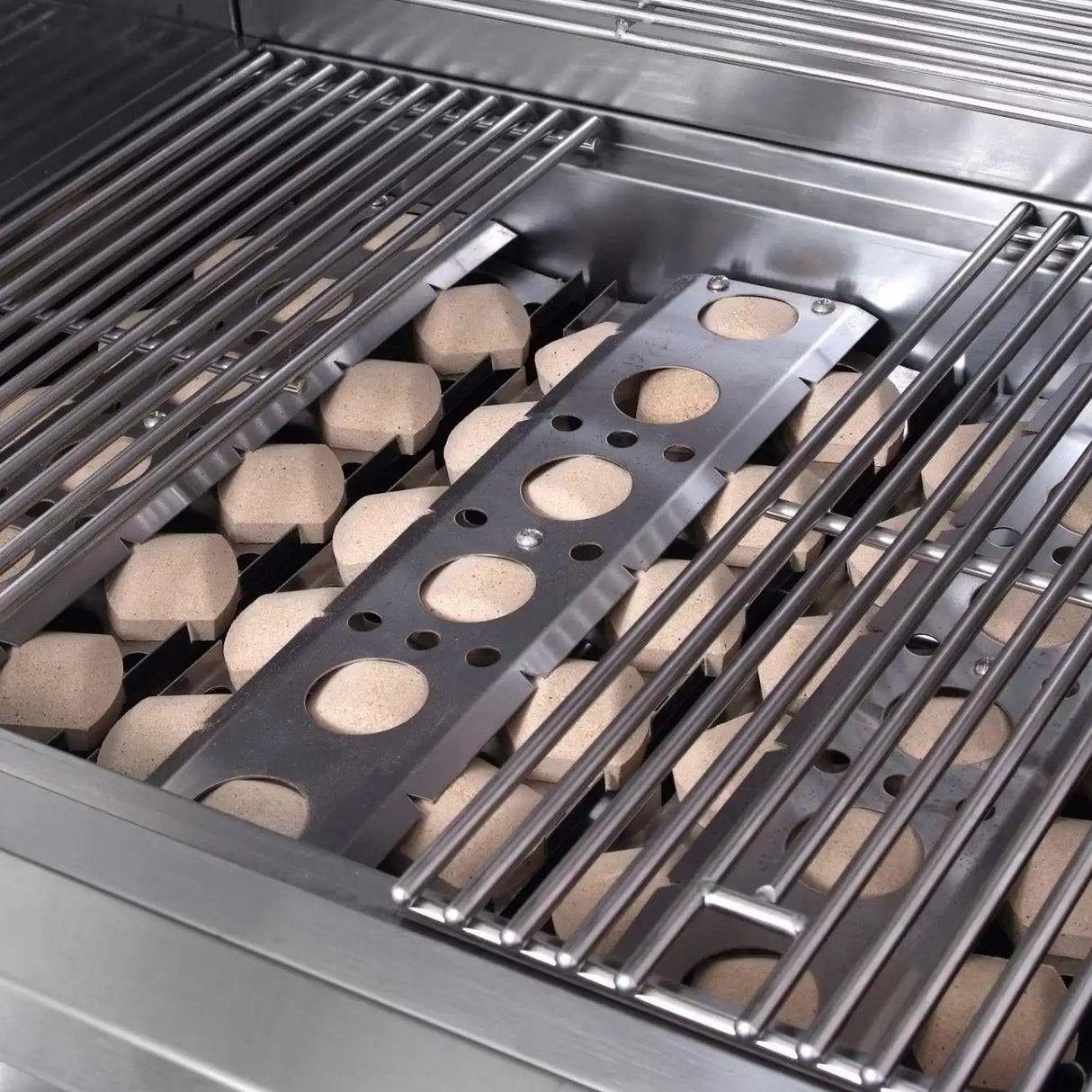 Ceramic Briquets below the grill grates on the RCS 40-Inch Premier Gas Grill, these provide strong even heat across the grilling surface