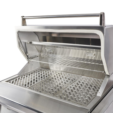 Angled view of the Coyote 36-Inch Pellet Grill showing stainless interior and Versa-Rack