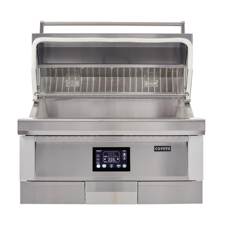 Coyote 36-Inch Built-In Pellet Grill with hood open and stainless steel grates