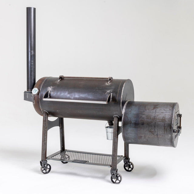 picture of an aaron franklin barbecue pit with quarter-inch rolled american steel and an 82-inch cook chamber, perfect for making unbelievable barbecue, available now at texas star grill shop