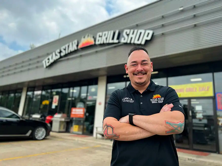 robert, a grilling expert & employee of texas star grill shop, outside one of their retail stores