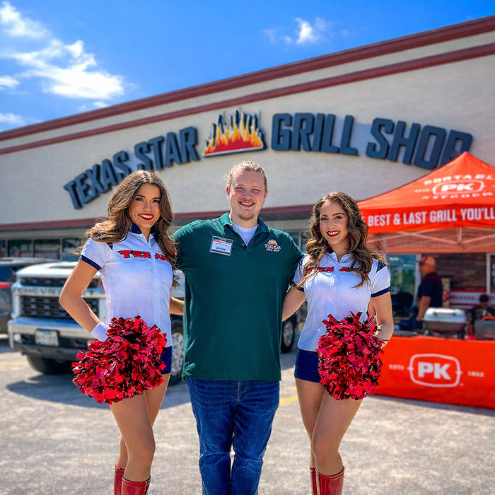Texas Star Grill Shop Woodlands showroom event with a staff member and two guests outside the store