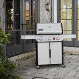 Weber Genesis SP-S-325 grill placed on patio outside double glass doors
