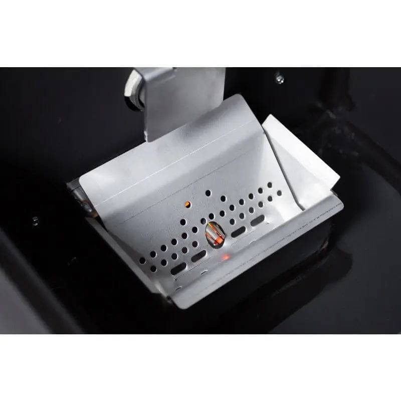 Close-up of Yoder Smokers YS640s burn pot and firebox assembly