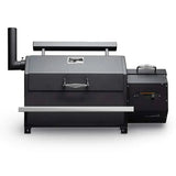 Side view of Yoder Smokers YS640s built-in pellet grill showing pellet hopper and exhaust stack on opposite sides