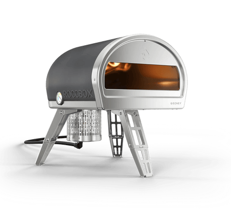 https://texasstargrillshop.com/cdn/shop/products/gozney-roccbox-gas-burning-pizza-oven-texas-star-grill-shop-grpgyus1093-662364.webp?v=1685638323&width=460